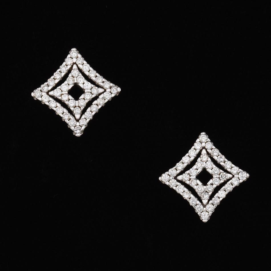Ladies' Chimento Italain Gold and Diamond Pair of Star: Ladies' Chimento Italain Gold and Diamond Pair of Star Earrings 1/2" x 1/2" 18k white gold pair of openwork star earrings with pierced push back, set with round brilliant cut diamonds, total estimated