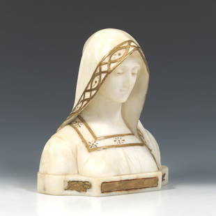 Attilio Fagioli (Italian, 1877 - 1966): 12" x 10-1/2" x 5-1/2" "Mater Purissima". Carved alabaster bust with gold pigment highlighting, signed in the back of the base. View and Bid on AspireAuctions.com