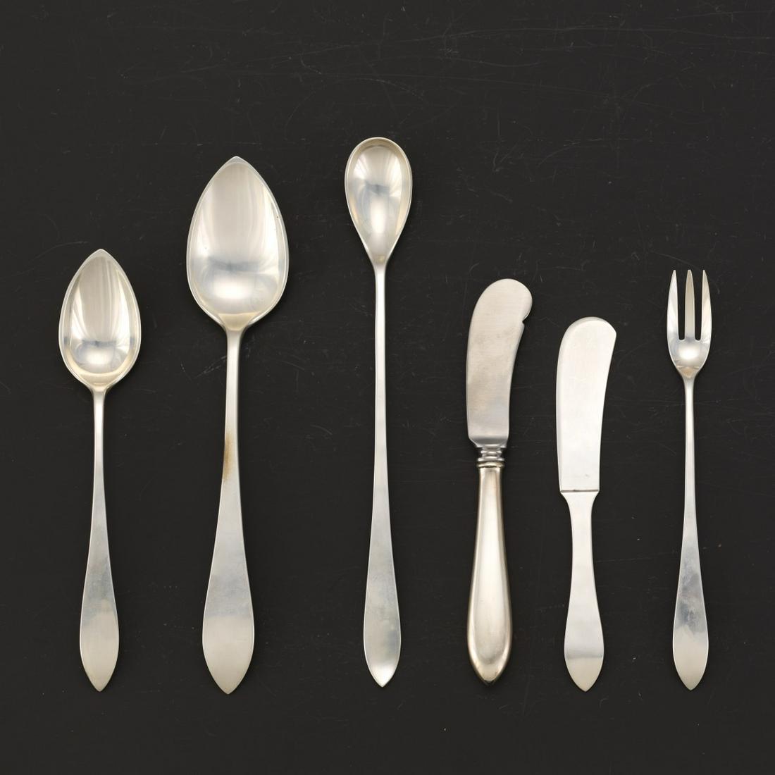 Old Newbury Crafters Flatware, "Old Newbury Pattern": Including: 4 iced tea spoons, 8-1/8"; 4 flat handled butter spreaders, 5-1/2"; 4 cocktail/seafood forks, 6-1/4"; 1 cream ladle, 5"; 6 oval soup spoons, 8"; 3 citrus spoons, 6-1/2"; 2 hollow handled bu