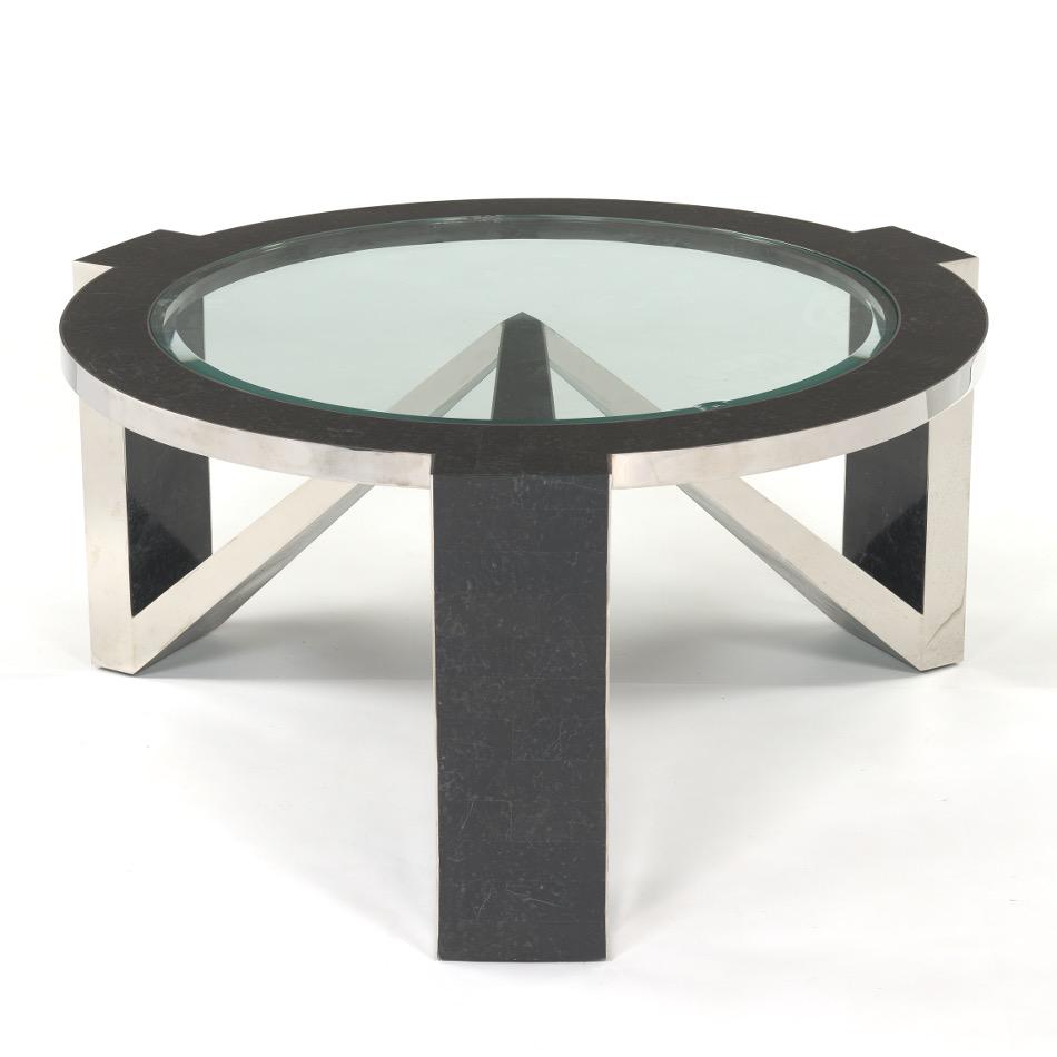 Gene Jonson and Robert Marcius Coffee Table: 18" x 38" Black tessellated stone and mirror polish stainless steel coffee table with glass top. View and Bid on AspireAuctions.com