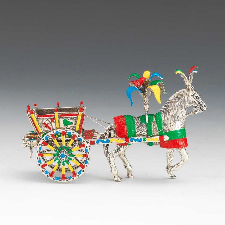 Italian Sterling Silver and Enamel Circus Horse with Carriage: 3-3/8" x 4-1/2" x 1-1/2" Finely crafted sterling silver 3D circus horse drawing a two-wheel cart, finished in polychrome enamels; fully marked on the bottom with Italian hallmarks. overall 151.2 gm. V