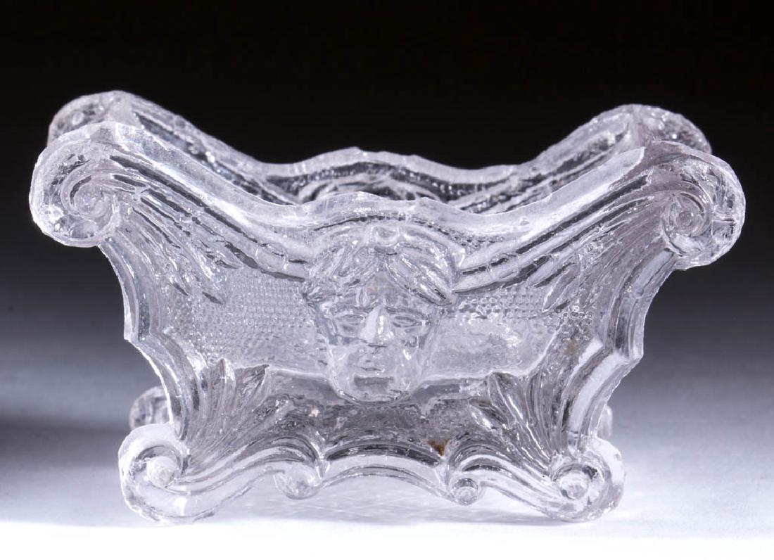 SC-16 SCROLL AND BEARDED FACE PRESSED OPEN SALT (1 of 1)