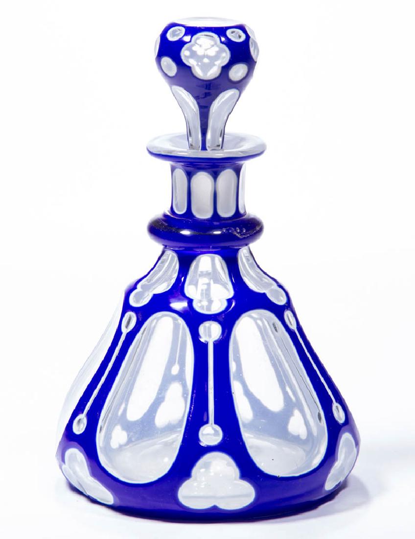 CUT DOUBLE OVERLAY LOOP AND Q-TIP COLOGNE BOTTLE (1 of 1)