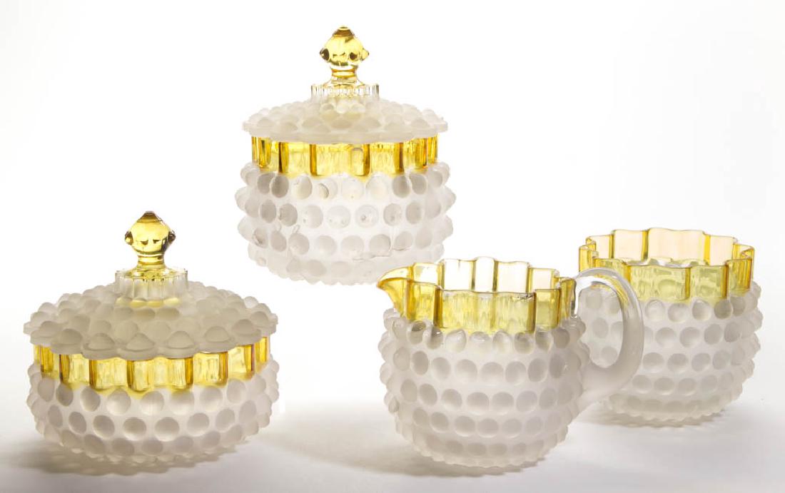 HOBBS NO. 323 / DEW DROP / HOBBS HOBNAIL FOUR-PIECE: HOBBS NO. 323 / DEW DROP / HOBBS HOBNAIL FOUR-PIECE TABLE SET, colorless with Frances decoration, comprising a covered butter dish, covered sugar bowl, creamer with applied handle, and spooner. Hobbs,