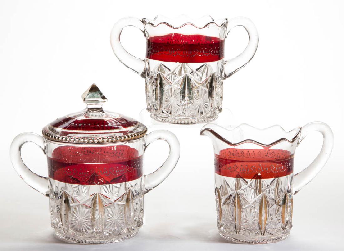 STARTEC - RUBY-STAINED TABLE ARTICLES, LOT OF THREE (1 of 1)