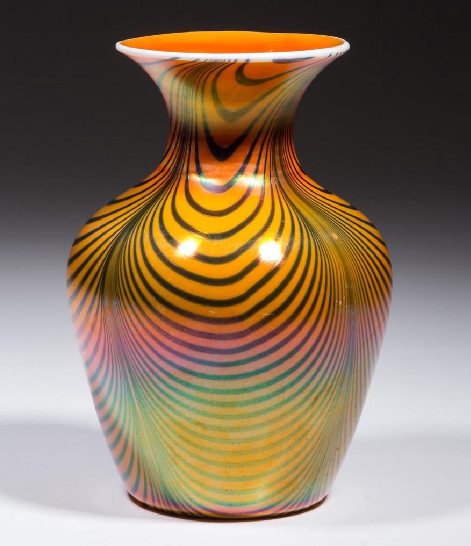 IMPERIAL DECORATED LEAD LUSTRE VASE: IMPERIAL DECORATED LEAD LUSTRE VASE, orange with four groups of blue loopings, Lead Lustre 417-22, polished pontil mark. Imperial Glass Co. Circa 1925. 6 1/4" H, 3 1/8" D rim, 2 3/4" D base. Undamaged
