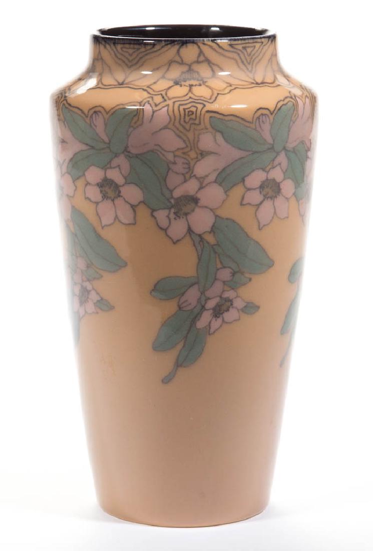 ROOKWOOD VELLUM SAX ART POTTERY VASE: ROOKWOOD VELLUM SAX ART POTTERY VASE, black linear floral design with polychrome enamel over peach ground, black glaze on interior. Artist signature for Sara Sax with intertwined "Sx". Marked with imp