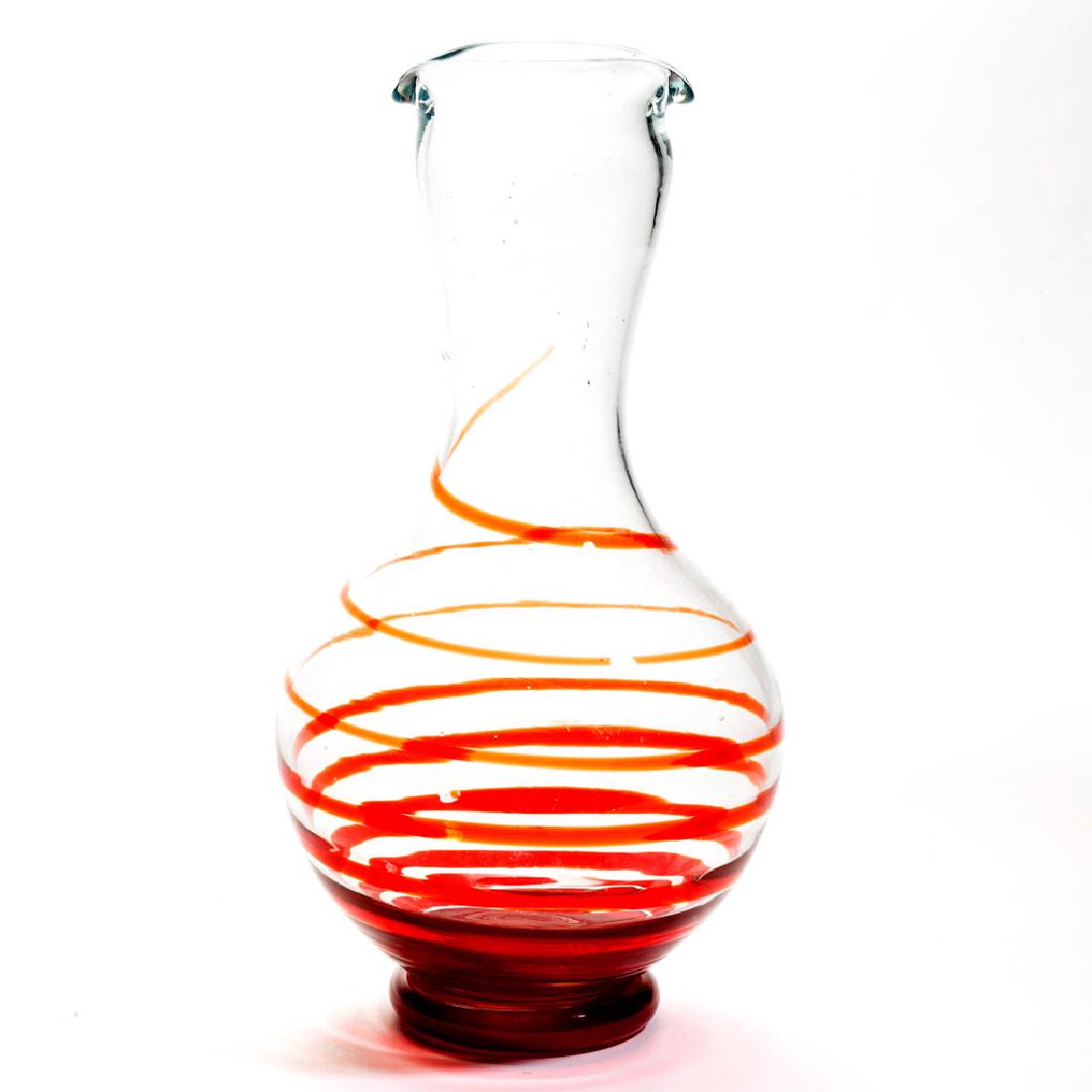 BLENKO SWISH-IT GLASS - WINSLOW ANDERSON COCKTAIL MIXER: BLENKO SWISH-IT GLASS - WINSLOW ANDERSON COCKTAIL MIXER, colorless with ruby swirls, double spout, signed, "WINSLOW ANDERSON/BLENKO", polished pontil mark. Mid-20th century. 10 3/4" H. Undamaged. Lite