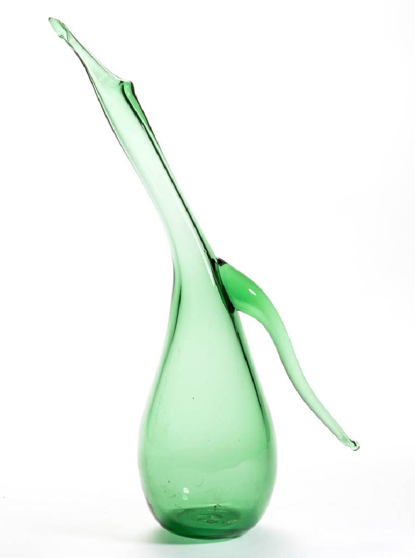 EXPERIMENTAL BLENKO FREEFORM GLASS - WINSLOW ANDERSON: EXPERIMENTAL BLENKO FREEFORM GLASS - WINSLOW ANDERSON BOTTLE, green, elongated neck and handle, factory-polished base, rough pontil mark. Mid-20th century. 15 1/8" HOA. Undamaged. Published: Piña - B
