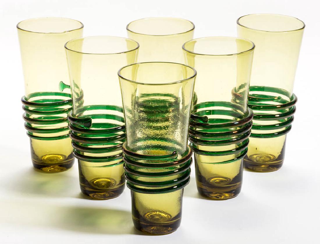 BLENKO NO. 600 GLASS - WINSLOW ANDERSON CHIMNEY HIBALL: BLENKO NO. 600 GLASS - WINSLOW ANDERSON CHIMNEY HIBALL GLASSES, LOT OF SIX, olive green, each with applied green iridescent spirals, each with a rough pontil mark. Mid-20th century. 6 5/8" to 6 3/4" H