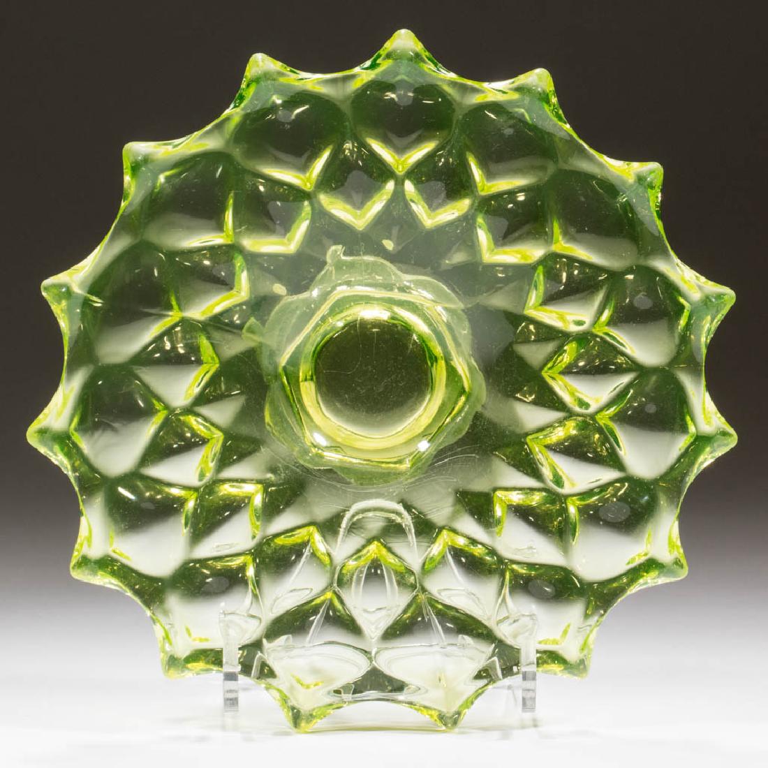 PRESSED SMOCKING PLATE ON FOOT (1 of 2)