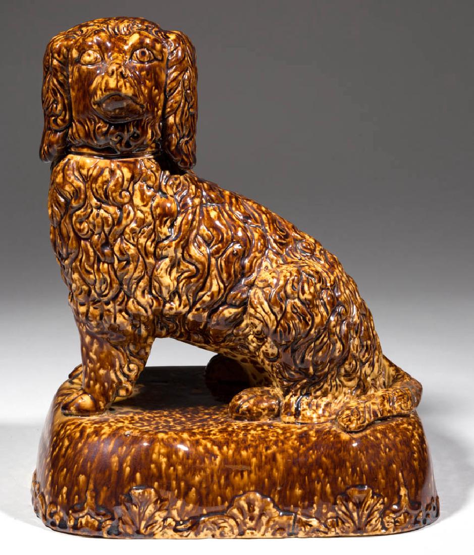 AMERICAN ROCKINGHAM-DECORATED YELLOWWARE SEATED SPANIEL (1 of 5)