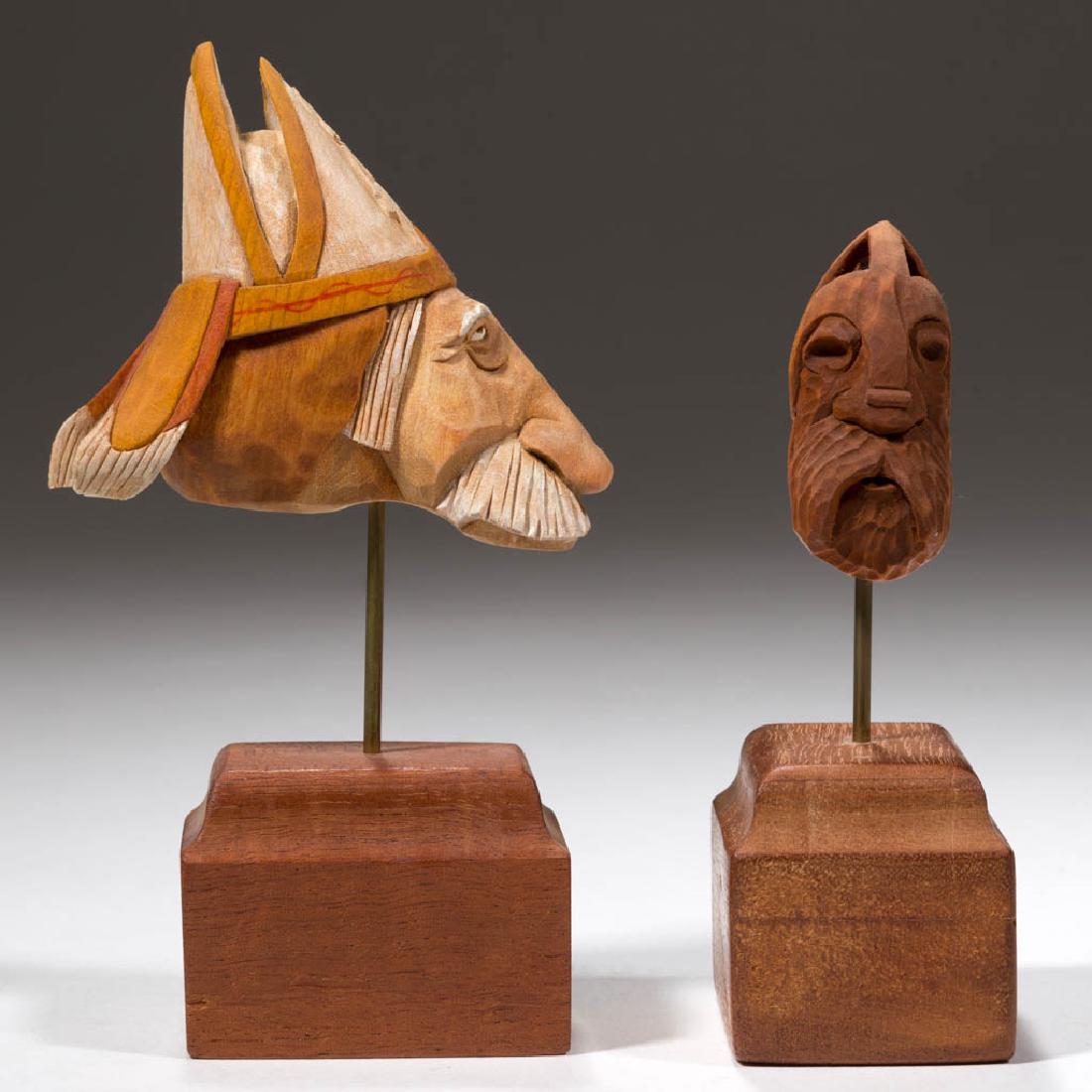 JOHN L. HEATWOLE (SHENANDOAH VALLEY OF VIRGINIA,: JOHN L. HEATWOLE (SHENANDOAH VALLEY OF VIRGINIA, 1948-2006) CARVINGS, LOT OF TWO, one lightly painted, the first depicting the head of a tired-looking bishop wearing a mitre with an image of a saint t