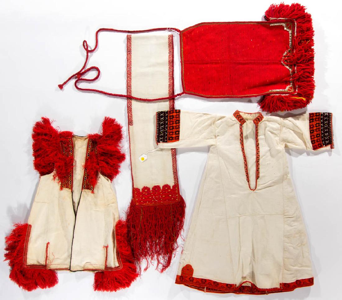 BALKAN ETHNIC TRADITIONAL FOLK COSTUME / SAYA: BALKAN ETHNIC TRADITIONAL FOLK COSTUME / SAYA, linen and cotton, comprising a dress/tunic, long vest, sash, and apron, each with red, yellow, and black embroidered decoration, and red fringes, the apr