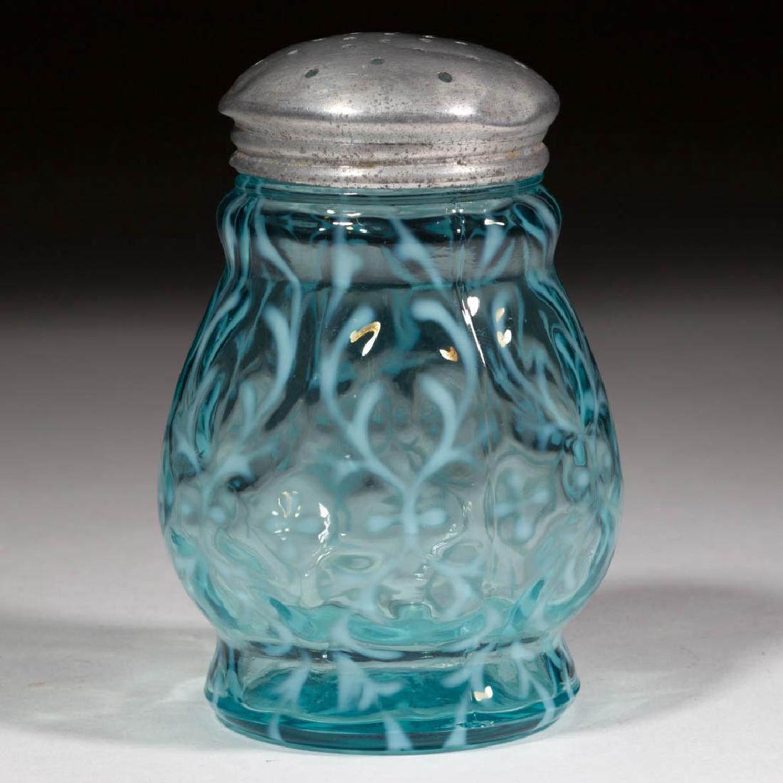 OPALINE BROCADE / SPANISH LACE SUGAR SHAKER: OPALINE BROCADE / SPANISH LACE SUGAR SHAKER, blue opalescent, period lid. Northwood Glass Co. Circa 1899. 4 5/8" HOA.Glass undamaged with typical roughness at the rim, as made, lid with some minor den