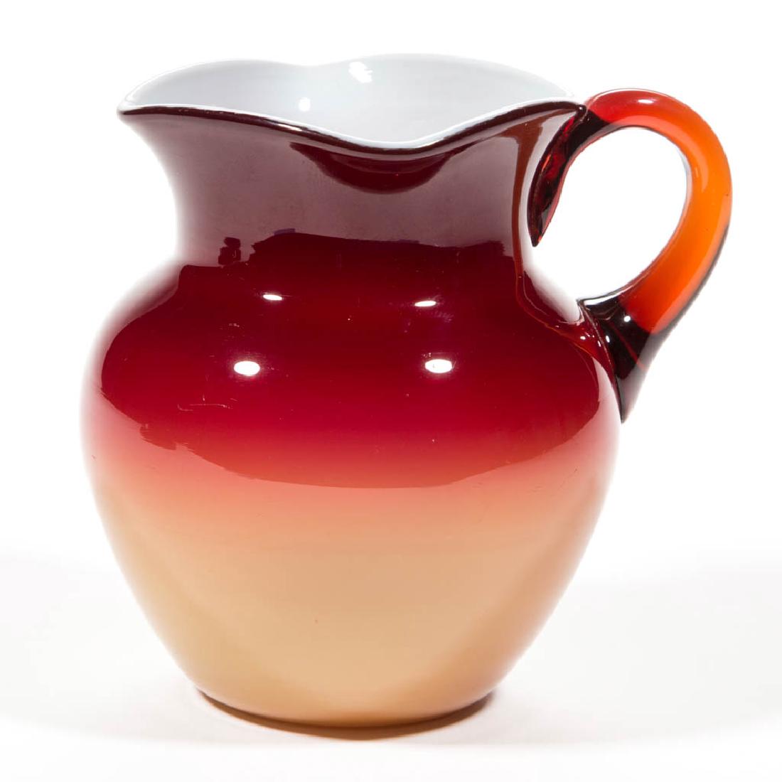 HOBBS CORAL (OMN) / PEACH BLOW NO. 319 / NO. 0 JUG /: HOBBS CORAL (OMN) / PEACH BLOW NO. 319 / NO. 0 JUG / PITCHER, glossy, square rim, applied handle, polished pontil mark. Hobbs, Brockunier & Co. Circa 1885. 4 1/4" H.Undamaged.Literature: Bredehofts -