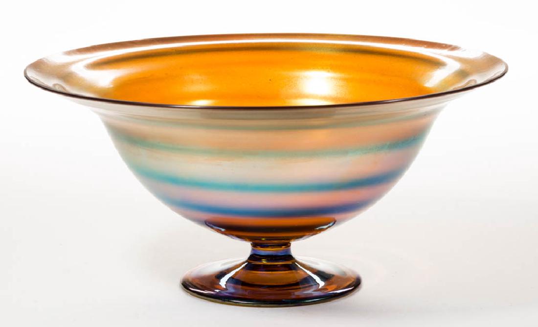 GOLDEN IRIDESCENT STUDIO ART GLASS FOOTED BOWL: GOLDEN IRIDESCENT STUDIO ART GLASS FOOTED BOWL, beehive interior, applied circular foot with polished pontil mark, spurious "LCT" signature, factory/artist polished rim. Maker unverified. Second half 