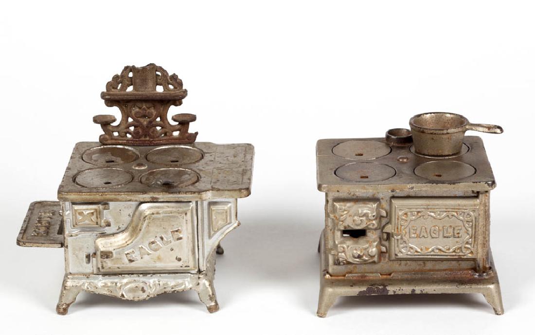 "EAGLE" CAST-IRON TOY COOK RANGE STOVES, LOT OF TWO (1 of 2)