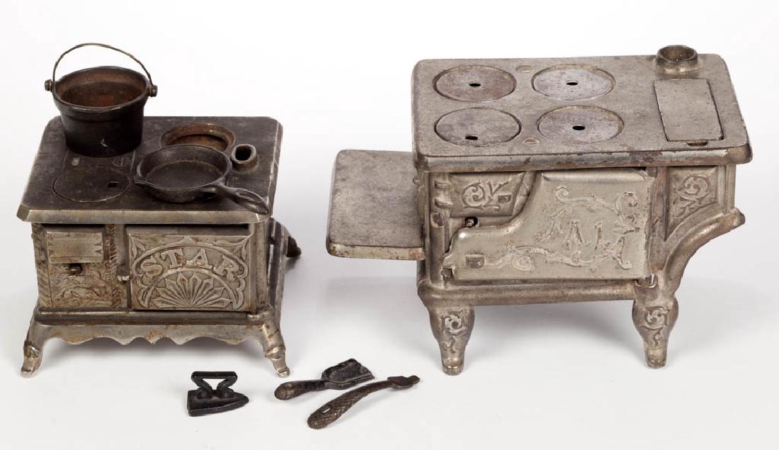 CAST-IRON TOY COOK RANGE STOVES, LOT OF TWO (1 of 2)