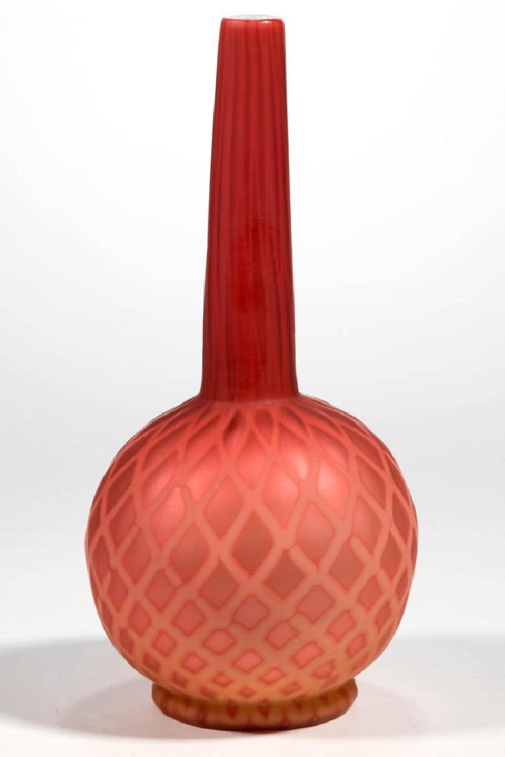ENGLISH DIAMOND-OPTIC AIR-TRAP MOTHER-OF-PEARL BUD VASE: ENGLISH DIAMOND-OPTIC AIR-TRAP MOTHER-OF-PEARL BUD VASE, deep cased apricot, polished pontil mark. Stevens and Williams or Thomas Webb & Sons. Fourth quarter 19th century. 7 1/4" H.Undamaged with a mi
