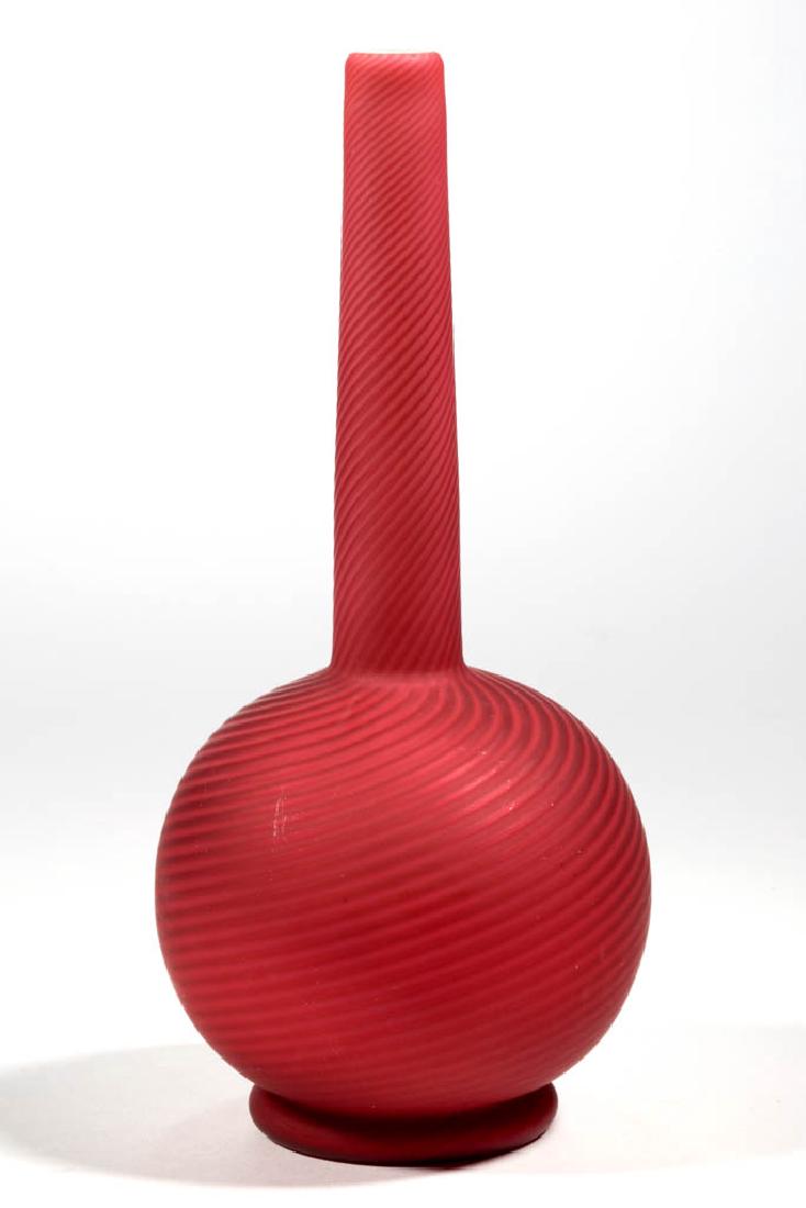 ENGLISH SWIRL AIR-TRAP MOTHER-OF-PEARL BUD VASE: ENGLISH SWIRL AIR-TRAP MOTHER-OF-PEARL BUD VASE, deep cased cranberry, polished pontil mark. Stevens and Williams or Thomas Webb & Sons. Fourth quarter 19th century. 7 3/8" H.Undamaged with a few mino