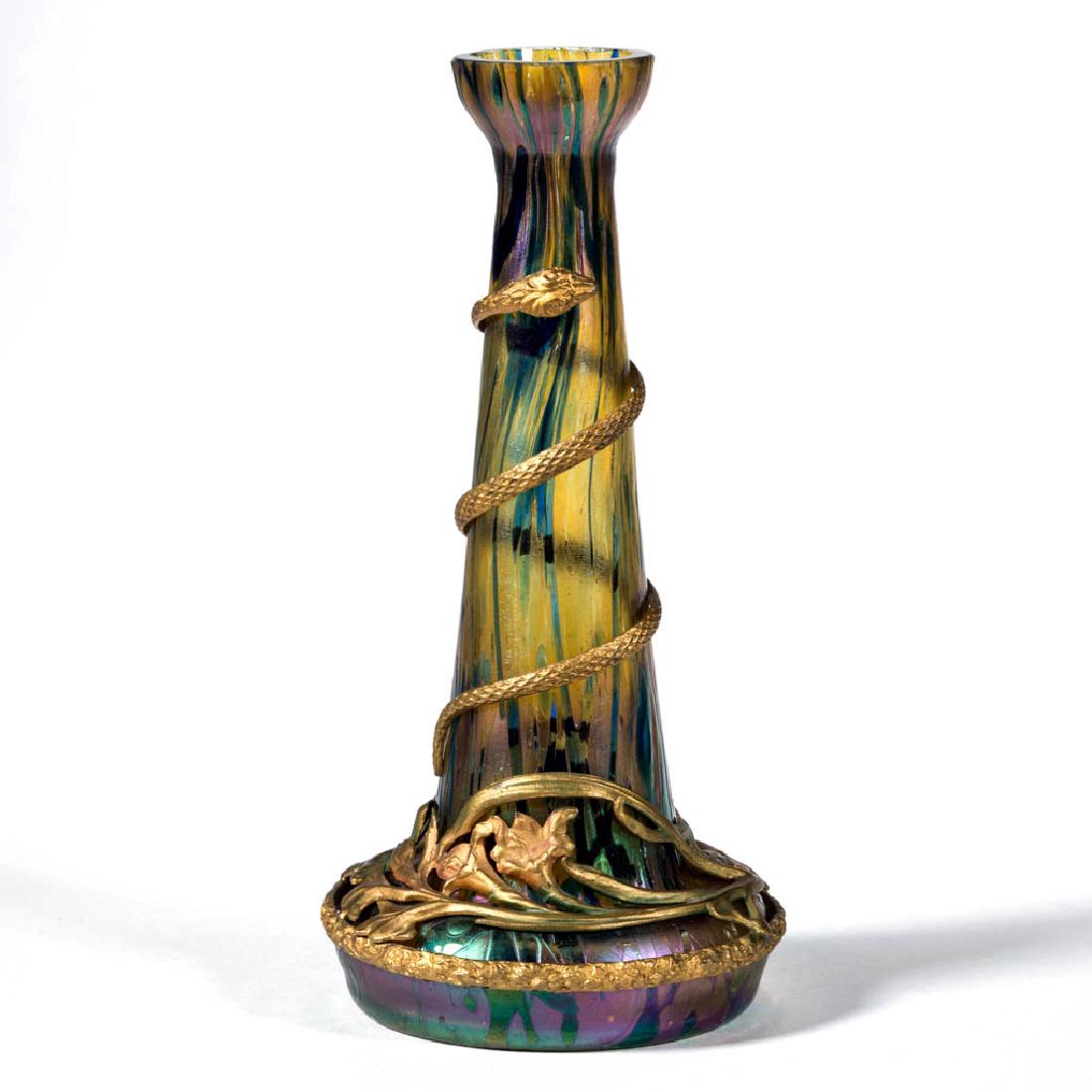 KRALIK ATTRIBUTED BACILLUS - METAL OVERLAY ART GLASS: KRALIK ATTRIBUTED BACILLUS - METAL OVERLAY ART GLASS CABINET VASE, colorless ground with gold mottling and cobalt blue spatter, gilt-metal floral decoration to the base, figural gilt-metal snake aroun