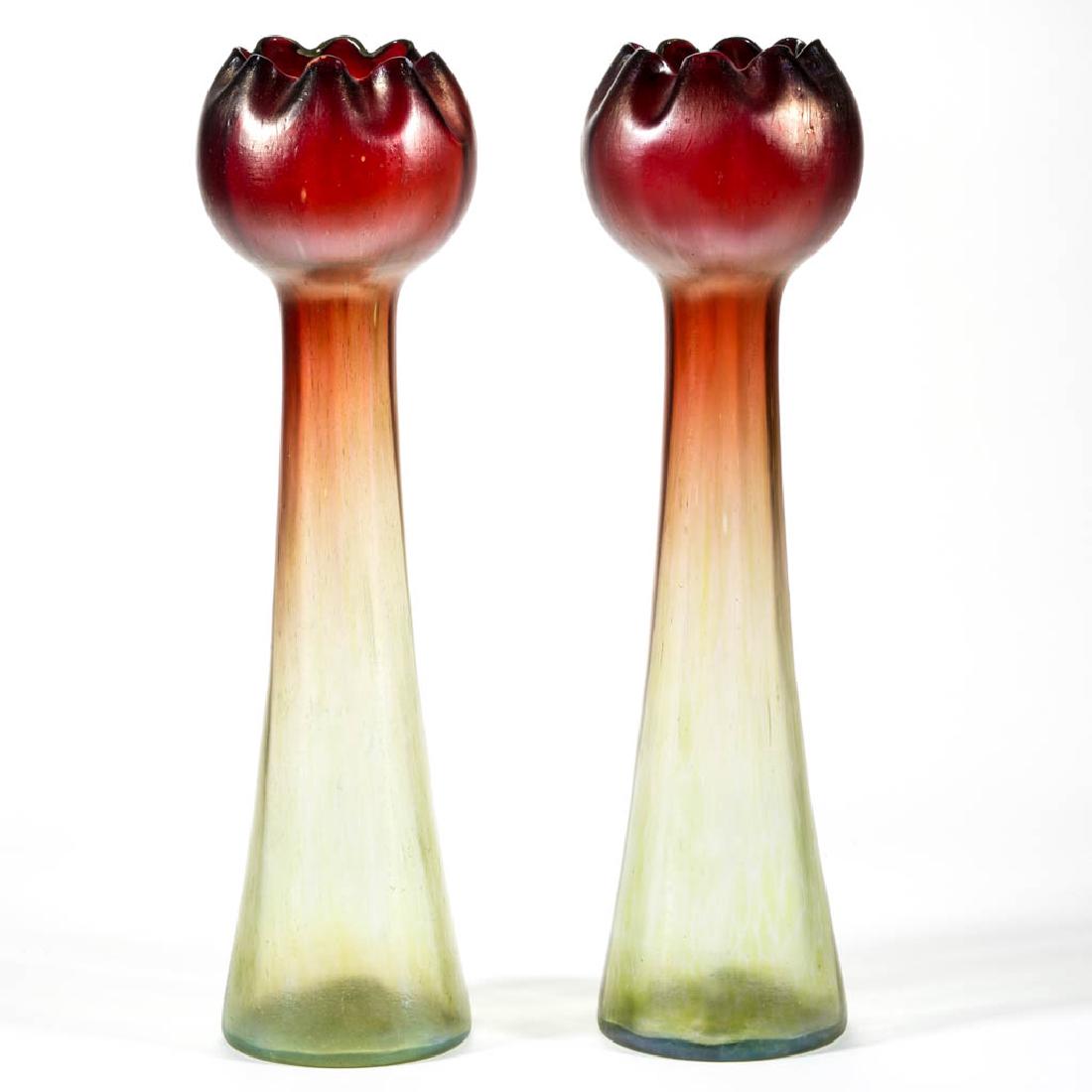 RINDSKOPF ATTRIBUTED PEPITA ART GLASS PAIR OF VASES: RINDSKOPF ATTRIBUTED PEPITA ART GLASS PAIR OF VASES, wine red shading to light green, each rib-optic hyacinth form with tooled rim having eight crimps, rough pontil marks. J. Rindskopf Glassworks, Boh