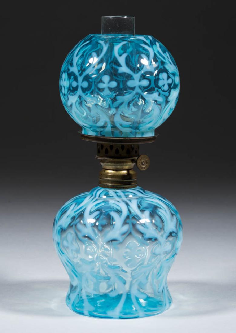 SPANISH LACE / OPALINE BROCADE MINIATURE LAMP: SPANISH LACE / OPALINE BROCADE MINIATURE LAMP, blue opalescent, matching patterned ball-form shade, period collar. Fitted with a period Nutmeg burner, colorless chimney. Northwood Glass Co. Fourth qua
