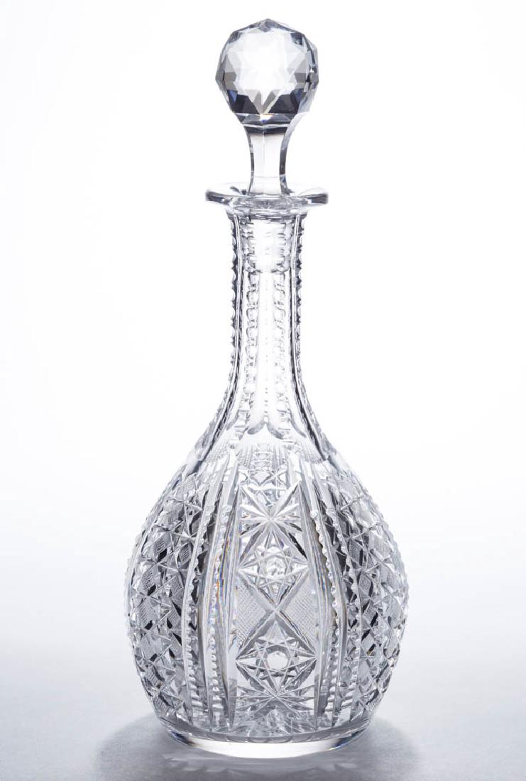 J. D. BERGEN "HERO" BRILLIANT CUT GLASS DECANTER: J. D. BERGEN "HERO" BRILLIANT CUT GLASS DECANTER, ball-form, notched prisms alternating with geometrical panels of criss-cross, stars and strawberry diamonds, panel-cut neck with notching to the edges