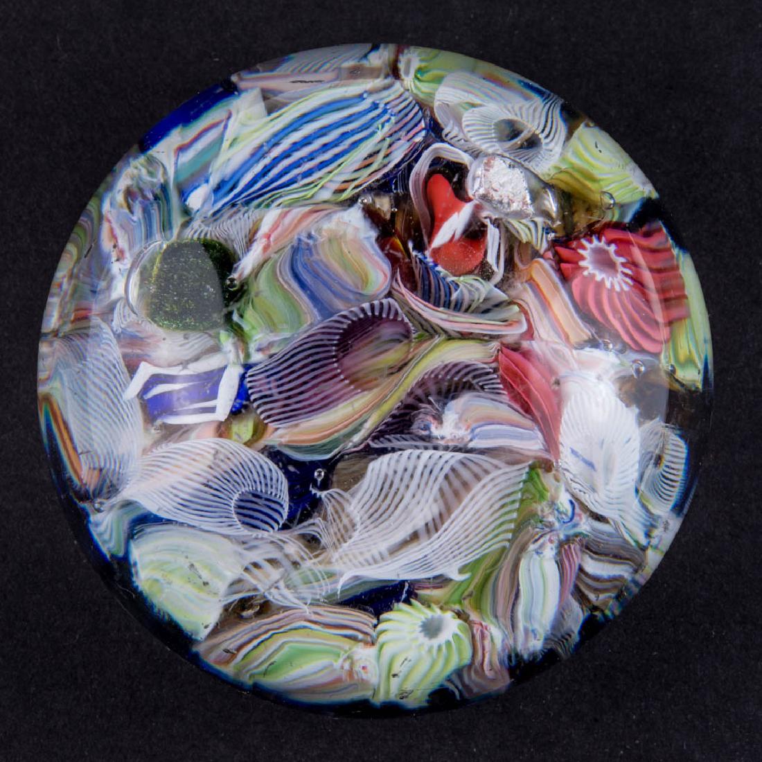 NEW ENGLAND SCRAMBLED MILLEFIORI PAPERWEIGHT: NEW ENGLAND SCRAMBLED MILLEFIORI PAPERWEIGHT, scrambled ground of latticinio ribbons and millefiori canes, polished pontil mark. New England Glass Co. or Boston & Sandwich Glass Co. 1850-1887. 1 5/8" 
