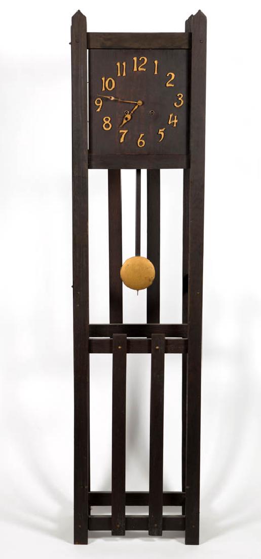 ARTS & CRAFTS STYLE MISSION OAK TALL-CASE CLOCK: ARTS & CRAFTS STYLE MISSION OAK TALL-CASE CLOCK, enclosed spring-driven movement, coil-gong chime; open oak stand; oak dial with raised gilt-painted numerals, gilt-painted hands and pendulum; movement