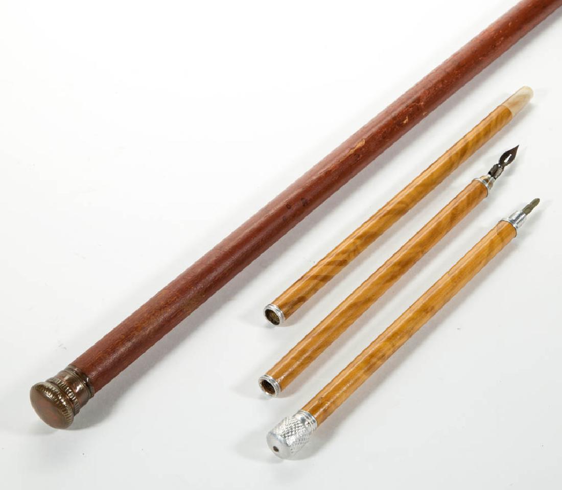 VINTAGE CONTINENTAL WRITER'S CANE / WALKING STICK: VINTAGE CONTINENTAL WRITER'S CANE / WALKING STICK, diminutive example in three sections, one for pencil, one with pen nib, one for ink or lead, metal top containing stanhope of Niagara Falls, bone fer