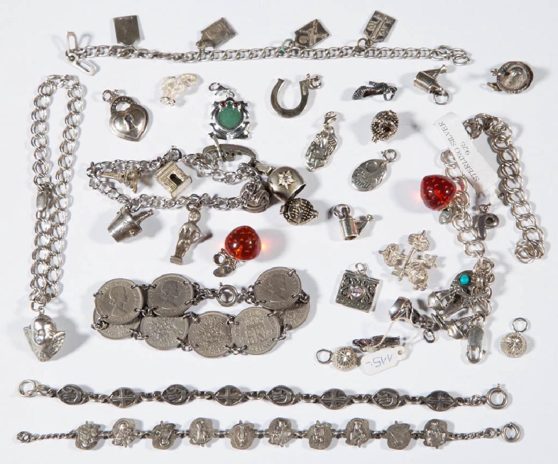 ASSORTED STERLING SILVER AND OTHER COSTUME JEWELRY: ASSORTED STERLING SILVER AND OTHER COSTUME JEWELRY, uncounted lot, including four charm bracelets, an Elizabeth II sixpence bracelet, and loose charms. Some marked sterling, others unmarked and of unk