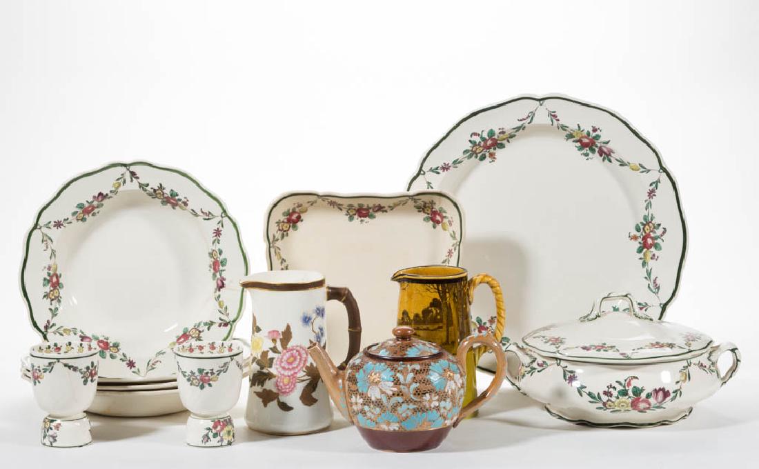 ENGLISH DOULTON CERAMIC ARTICLES, LOT OF 12: ENGLISH DOULTON CERAMIC ARTICLES, LOT OF 12, including four soup plates, one platter, one covered vegetable dish, square dish, and two egg cups all with the same polychrome enamel floral design. Mostl