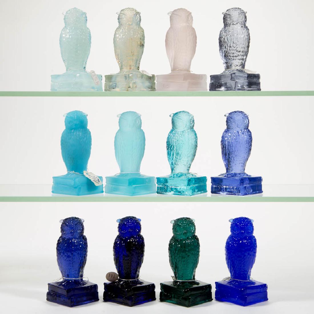 DEGENHART GLASS OWL FIGURES, LOT OF 12: DEGENHART GLASS OWL FIGURES, LOT OF 12, various shades of blue, or colorless, including a colorless frosted example, a Milk Blue frosted example, a pale blue frosted example, and an Alexandrite. Each