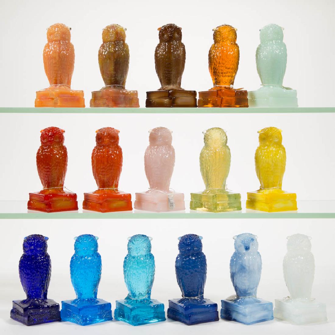 DEGENHART GLASS OWL FIGURES, LOT OF 16: DEGENHART GLASS OWL FIGURES, LOT OF 16, various colors, including a Fantastic, a Bloody Mary / Tomato, a Tangerine, a Buttercup, and a Cobalt Blue. Each with Degenhart "D" mark. Crystal Art Glass Co.,