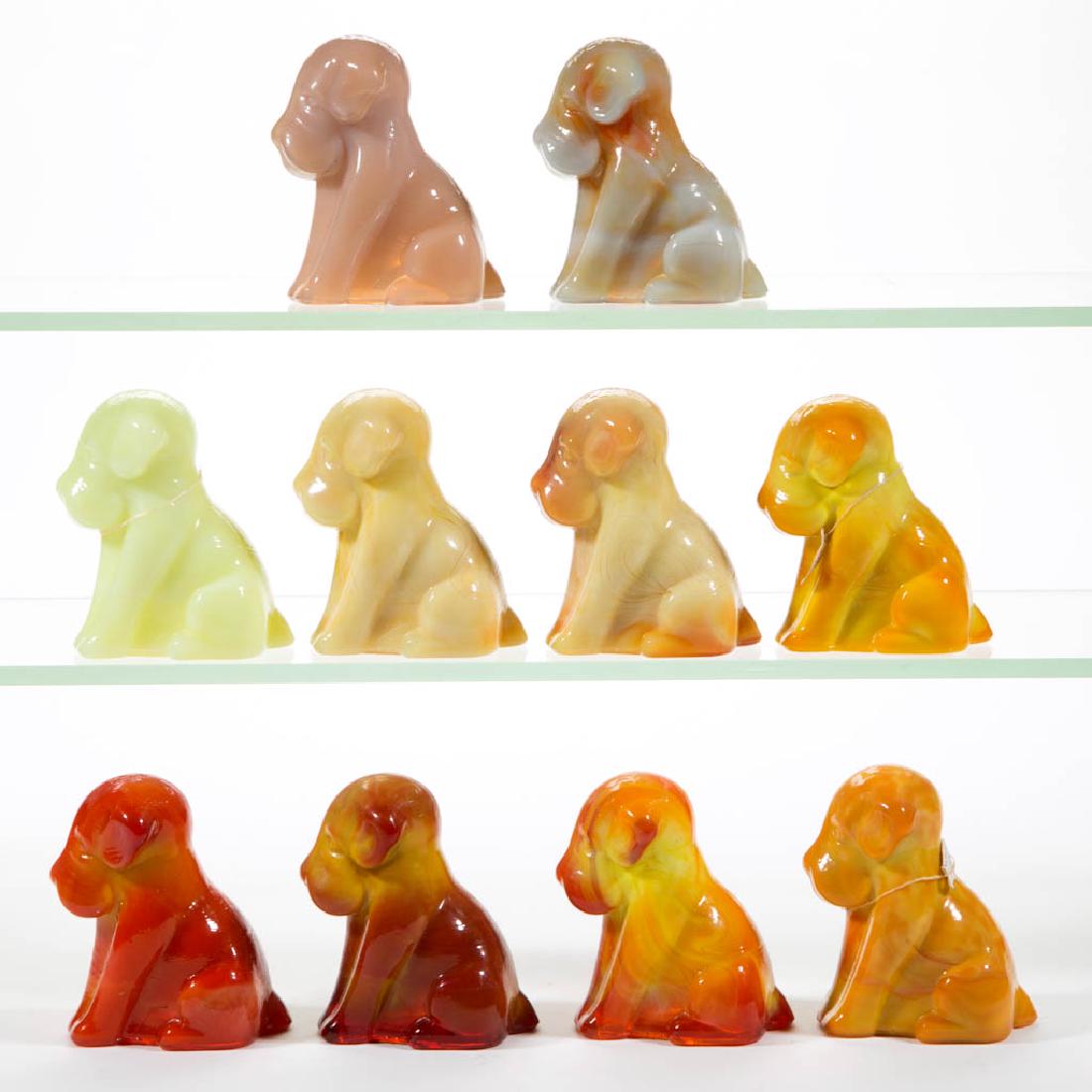 DEGENHART GLASS DOG / POOCH FIGURES, LOT OF TEN: DEGENHART GLASS DOG / POOCH FIGURES, LOT OF TEN, various colors, including a Bloody Mary / Tomato, a Fantastic, a Buttercup Slag, a Crown Tuscan, and various shades or red, orange or custard slag. Eac