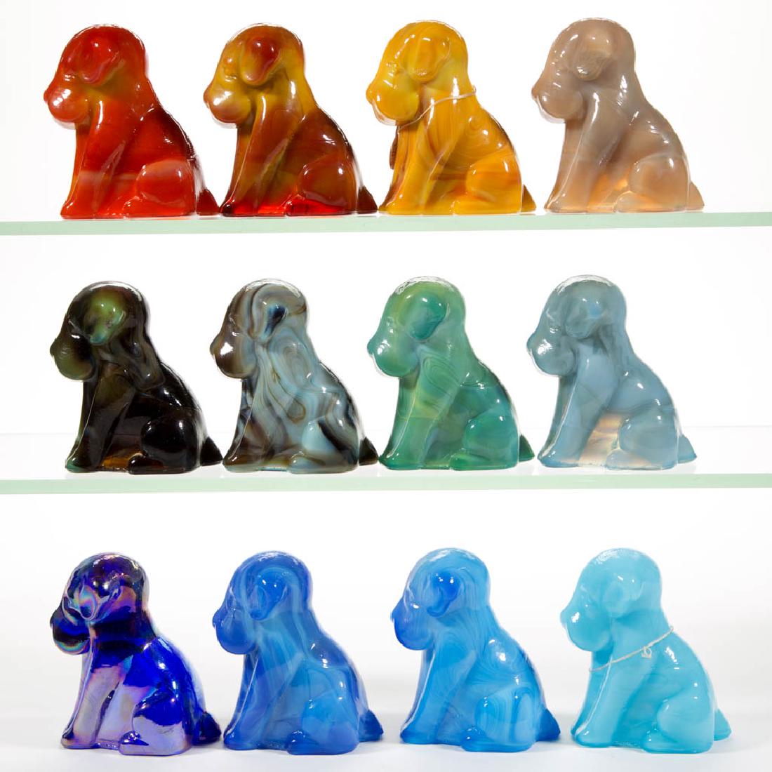 DEGENHART GLASS DOG / POOCH FIGURES, LOT OF 12: DEGENHART GLASS DOG / POOCH FIGURES, LOT OF 12, various colors, including a Bloody Mary / Tomato, a Fantastic, a Bittersweet, an iridescent Cobalt Carnival, and several green and blue slag variations.