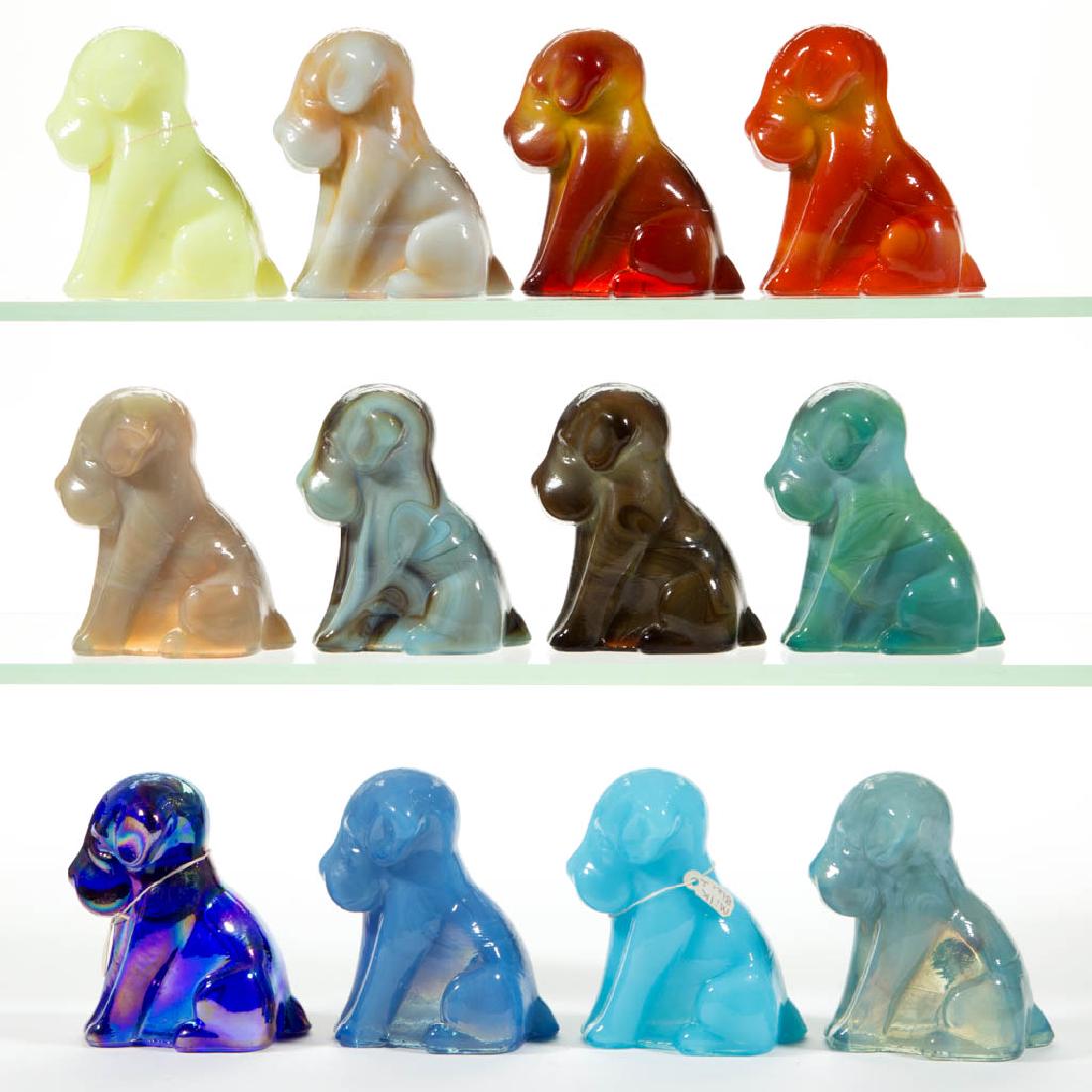 DEGENHART GLASS DOG / POOCH FIGURES, LOT OF 12: DEGENHART GLASS DOG / POOCH FIGURES, LOT OF 12, various colors, including a Bloody Mary / Tomato, a Fantastic, a Daffodil, and a Milk Blue. Each with Degenhart "D" in heart trademark. Crystal Art Glas
