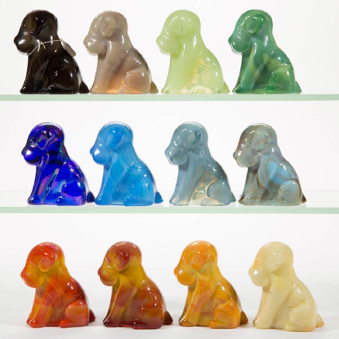 DEGENHART GLASS DOG / POOCH FIGURES, LOT OF 12: DEGENHART GLASS DOG / POOCH FIGURES, LOT OF 12, various colors, including a Bloody Mary / Tomato, a Fantastic, a Daffodil, and a Bittersweet. Each with Degenhart "D" in heart trademark. Crystal Art Gl