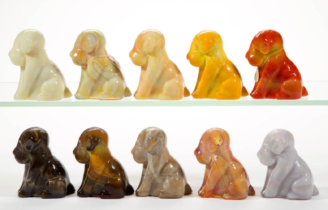 DEGENHART GLASS DOG / POOCH FIGURES, LOT OF TEN: DEGENHART GLASS DOG / POOCH FIGURES, LOT OF TEN, various colors, including slag, including a Bloody Mary / Tomato, a Bittersweet Slag, a Buttercup Slag, a Custard Light, a dark Toffee, and a light Tof