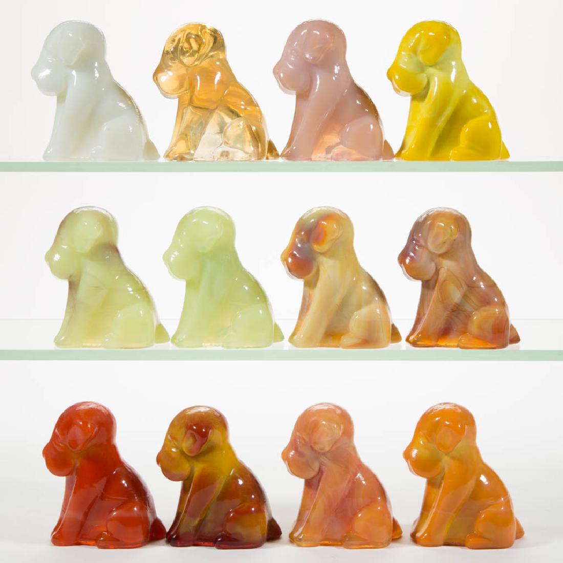 DEGENHART GLASS DOG / POOCH FIGURES, LOT OF 12: DEGENHART GLASS DOG / POOCH FIGURES, LOT OF 12, various colors, including a Fantastic, a Bloody Mary / Tomato, a Buttercup, a Tangerine, a Peach Blo, a Snow White, a Bittersweet Slag, a Daffodil, and 