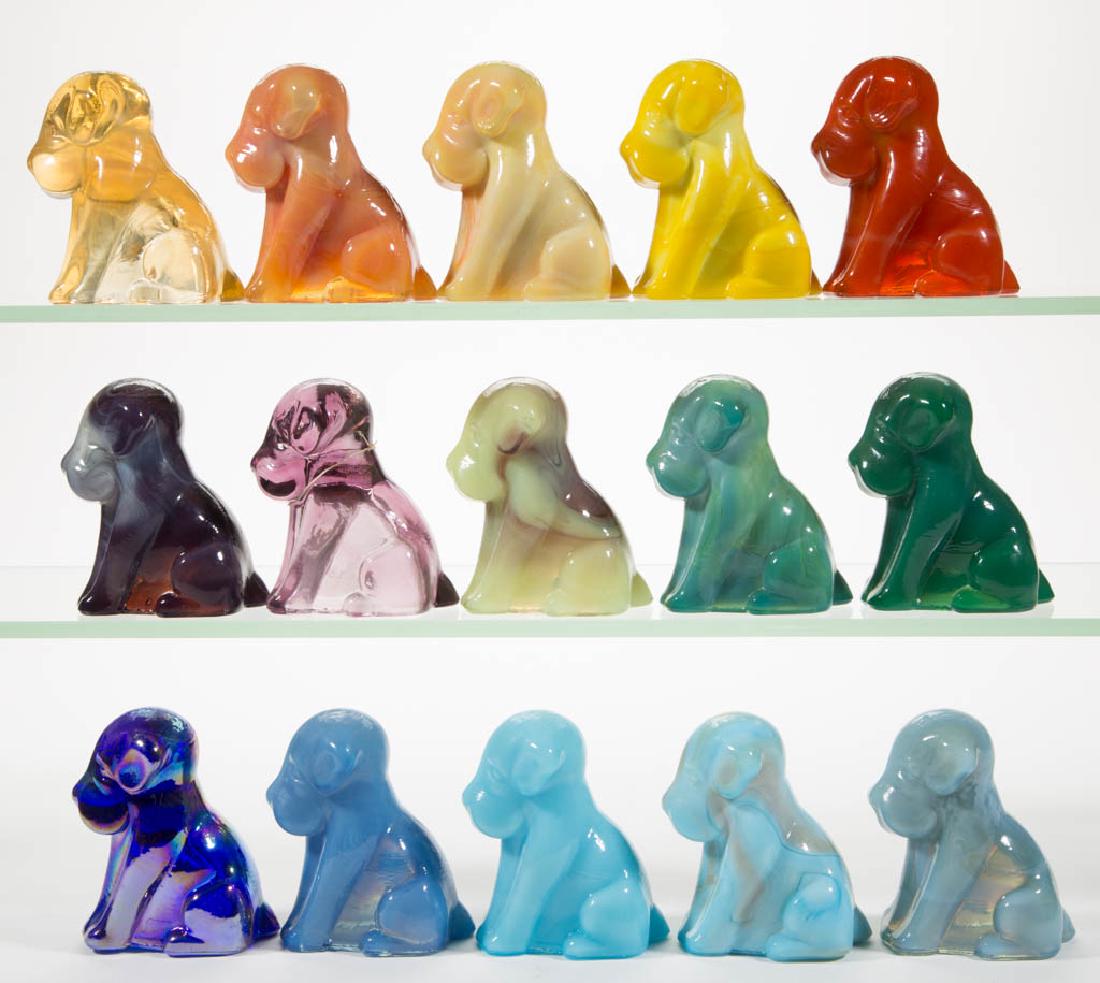 DEGENHART GLASS DOG / POOCH FIGURES, LOT OF 15: DEGENHART GLASS DOG / POOCH FIGURES, LOT OF 15, various colors, including a Bloody Mary / Tomato, a Buttercup, a Daffodil Slag with streaks of lavender, a Tangerine, a Milk Blue, a Jade, and an irides