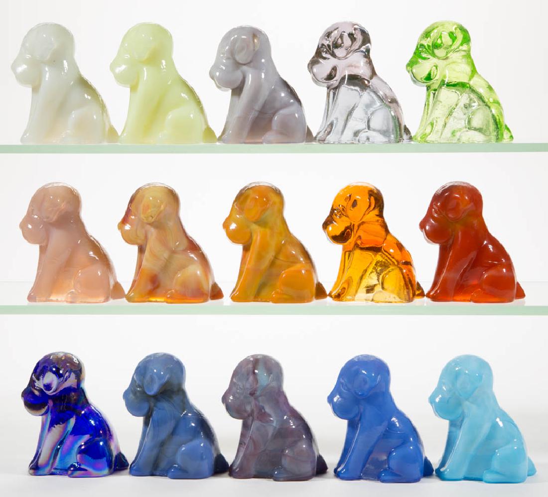 DEGENHART GLASS DOG / POOCH FIGURES, LOT OF 15: DEGENHART GLASS DOG / POOCH FIGURES, LOT OF 15, various colors, including a Bloody Mary / Tomato, a Peach Blo, a Bittersweet Slag, a Buttercup Slag, a Snow White, a January Blizzard, and an Apple Gree