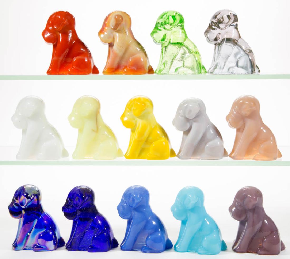 DEGENHART GLASS DOG / POOCH FIGURES, LOT OF 14: DEGENHART GLASS DOG / POOCH FIGURES, LOT OF 14, various colors, including a Bloody Mary / Tomato, a Peach Blo, a Bittersweet Slag, a Daffodil Slag with streaks of lavender, a Buttercup, a Snow White, 