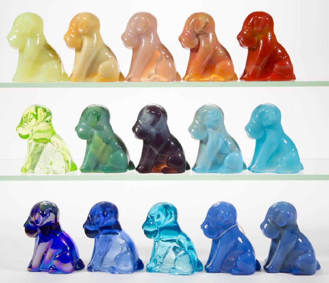 DEGENHART GLASS DOG / POOCH FIGURES, LOT OF 15: DEGENHART GLASS DOG / POOCH FIGURES, LOT OF 15, various colors, including a Bloody Mary / Tomato, a Peach Blo, a Daffodil Slag with streaks of lavender, a Tangerine, a Sapphire Blue, a Milk Blue, and 