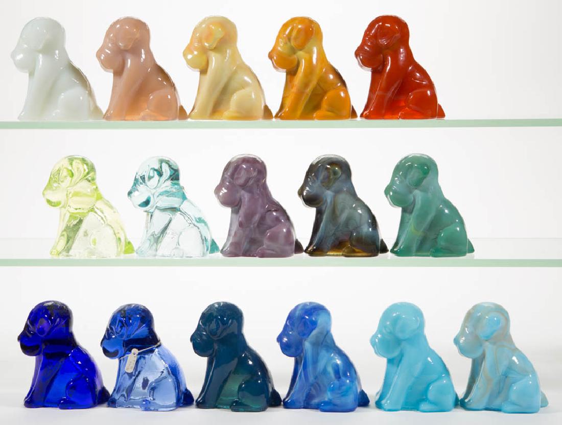 DEGENHART GLASS DOG / POOCH FIGURES, LOT OF 16: DEGENHART GLASS DOG / POOCH FIGURES, LOT OF 16, various colors, including a Bloody Mary / Tomato, a Buttercup Slag, a Milk Blue, a Snow White, an Apple Green, and a Vaseline, the latter two reacting t