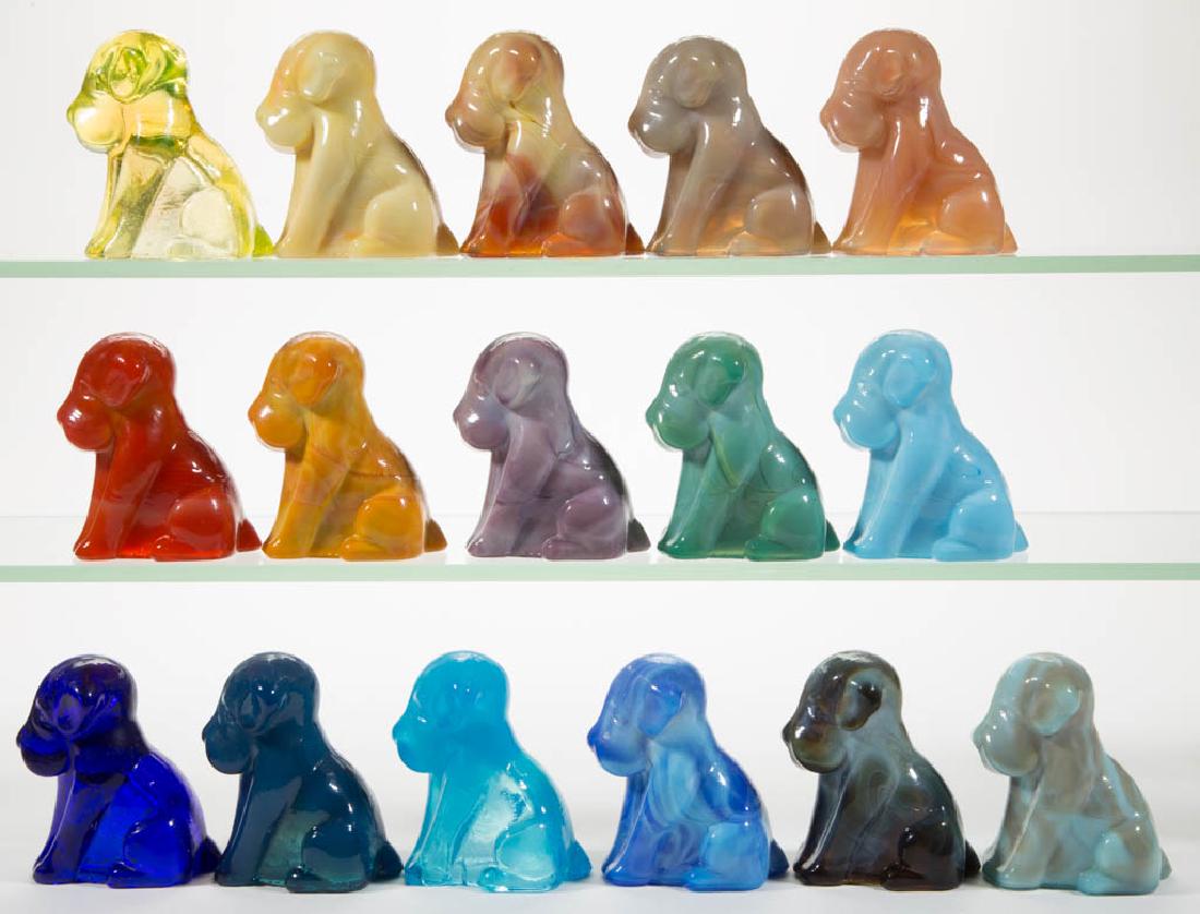 DEGENHART GLASS DOG / POOCH FIGURES, LOT OF 16: DEGENHART GLASS DOG / POOCH FIGURES, LOT OF 16, various colors, including a Bloody Mary / Tomato, an Orchid Slag, a Buttercup Slag, a Cobalt Blue, and a Canary (black lighted). Each with Degenhart "D"