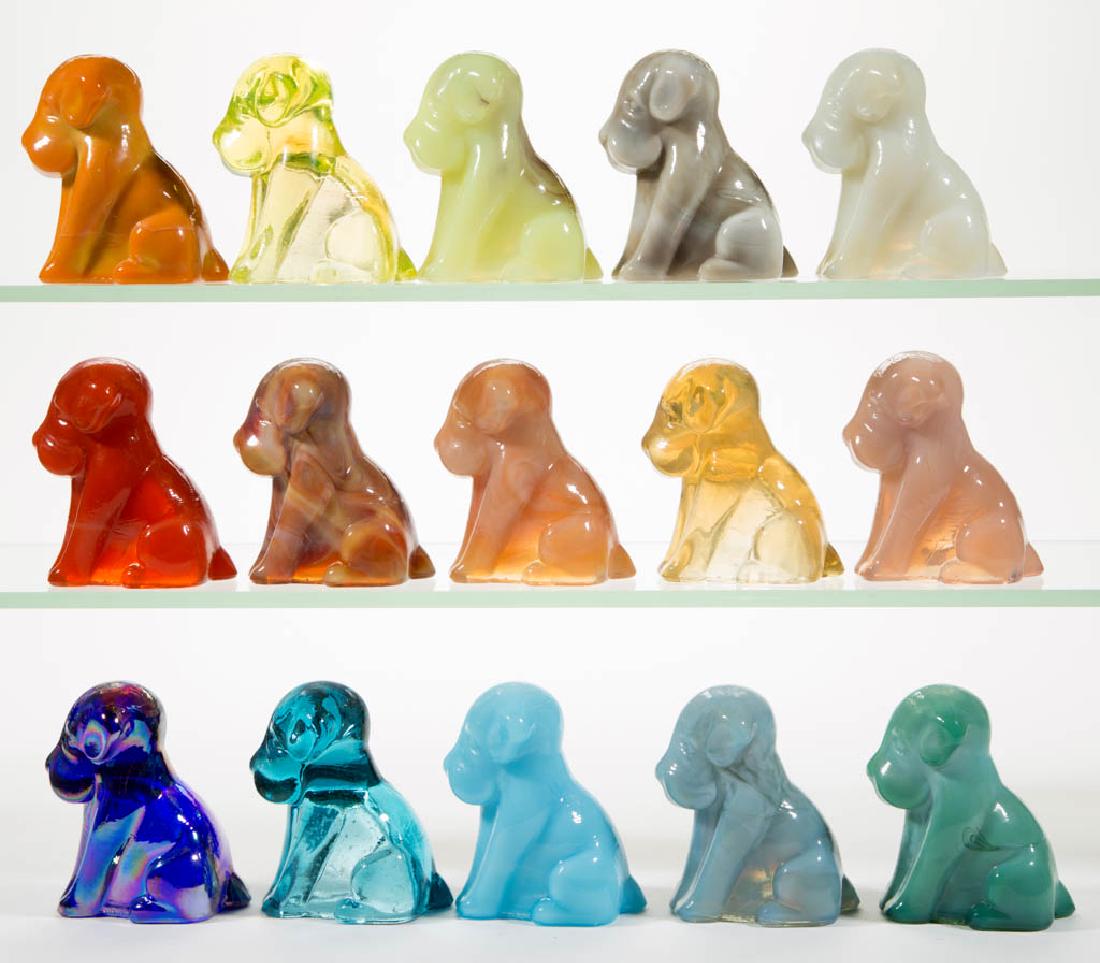 DEGENHART GLASS DOG / POOCH FIGURES, LOT OF 15: DEGENHART GLASS DOG / POOCH FIGURES, LOT OF 15, various colors, including a Bloody Mary / Tomato, a Buttercup Slag, a Bittersweet Slag, a Tangerine, a Daffodil Slag with streaks of lavender, a Milk Bl