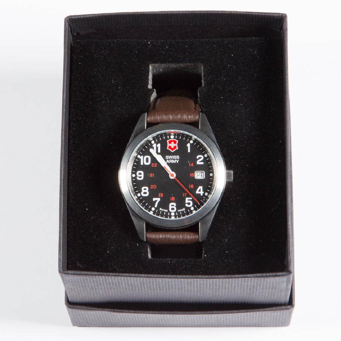 VICTORINOX SWISS ARMY BRAND WRIST WATCH: VICTORINOX SWISS ARMY BRAND WRIST WATCH, with leather band, in original box. 20th/early 21st century. Excellent, unused condition. Provenance: The 65-year collection of Barbara Sisson, Charleston, WV.